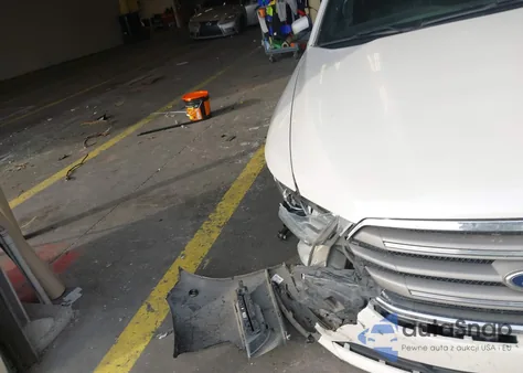 2015 Ford Taurus Sel z USA, uszkodzony, nr VIN 1FAHP2H89FG201969